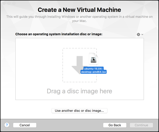 drag an ISO disk image onto VMware Fusion to start the install process