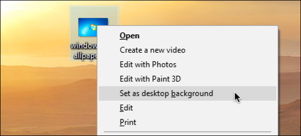 right click on image file > set as desktop wallpaper windows 10