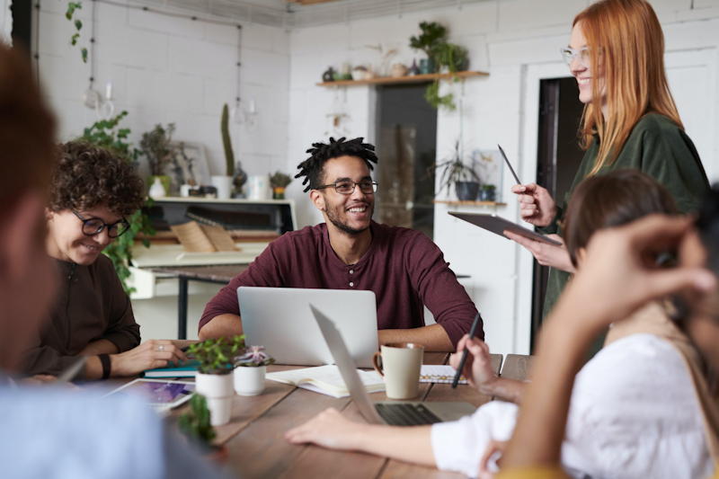 people millennials meeting laptop computer