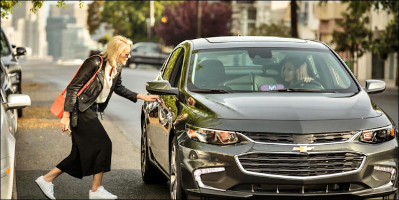 woman getting into car - ridesharing