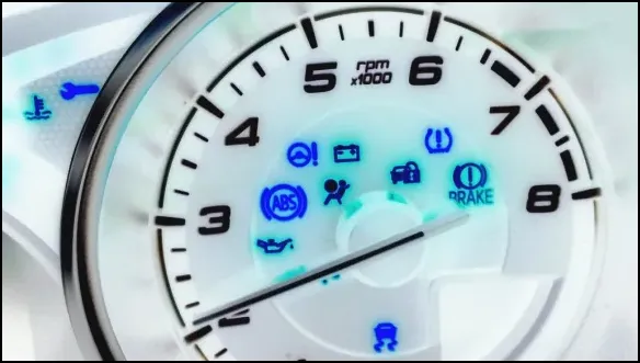 car dashboard guage display with alert lights