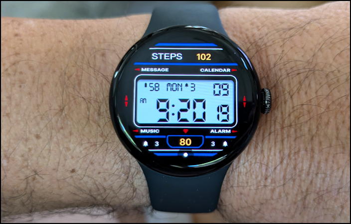 google pixel watch 3 with third-party retro digital face on wrist
